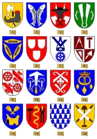 Bildtafel von Wappen verschiedener Handwerkszünfte:1.Schuster2.Fischer3.Schlachter4.Tuchmacher5.Weber6.Maler7.Müller8.Maurer9.Zimmerer10.Dachdecker11.Schneider12.Bäcker13.Sattler14.Schmiede15.Kürschner16.Gerber